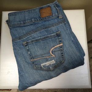American Eagle Artist light wash jeans with holes